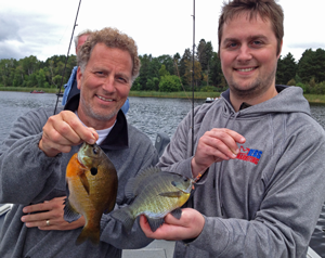 image of anglers with bluegills