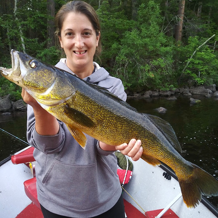 image of girl with nice walleye caught in the Ely MN area