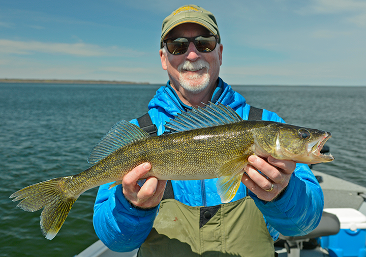 image of Craig Anderson with a nice winnie walleye 