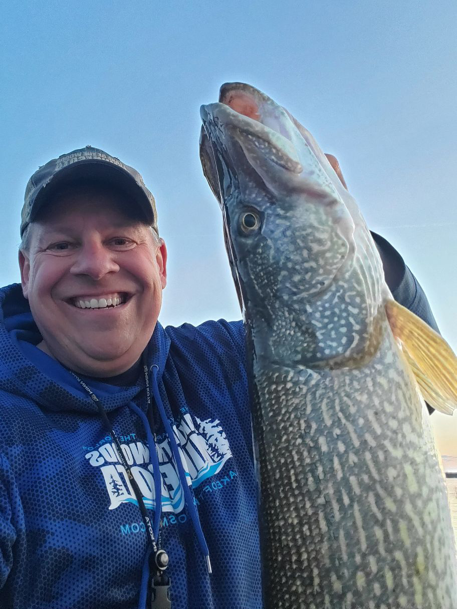 image of Joe Henry with huge Northern Pike caught on Lake of the Woods