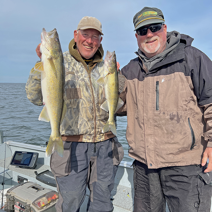 image of Larry Lashley and Jeff Sundin with nice walleye double on Lake Winnie