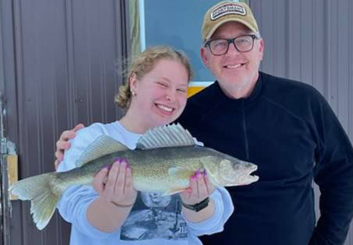 image of father and daughter with big walleye causght on Lake of the Woods