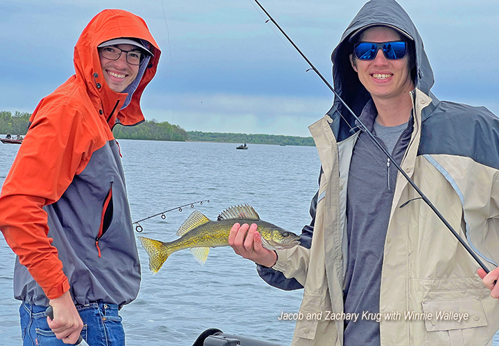 image of Jacob and Zachary Krug with a lake winnie walleye