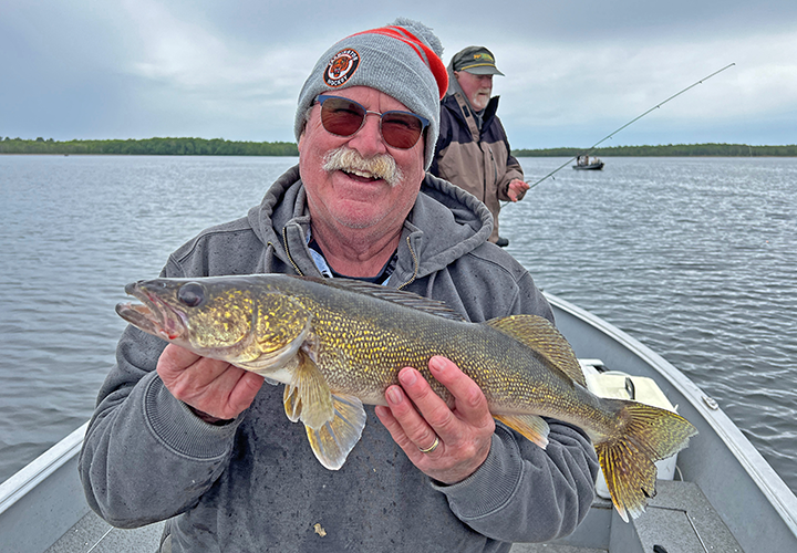 image of Mike Cooley with nice walleye caught on Lake Winnibigoshish