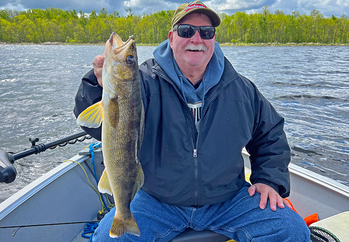 Fritz Becker with nice walleye caught on a fishing charter with Hall of Fame fishing guide Jeff Sundin 