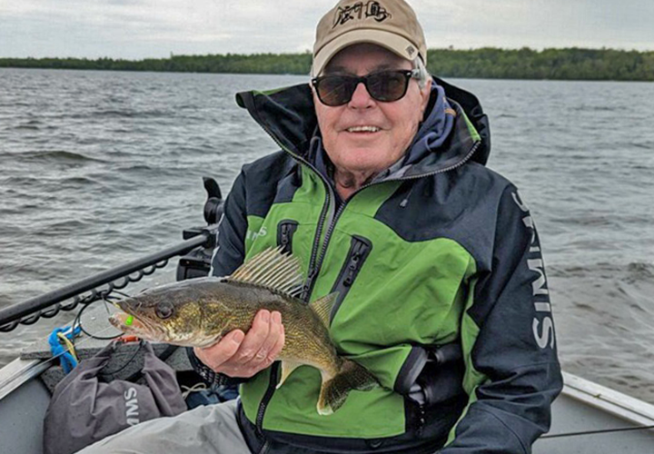image of Dick Williams holding nice walleye caught on a fishing trip with Pro Guide Jeff Sundin 