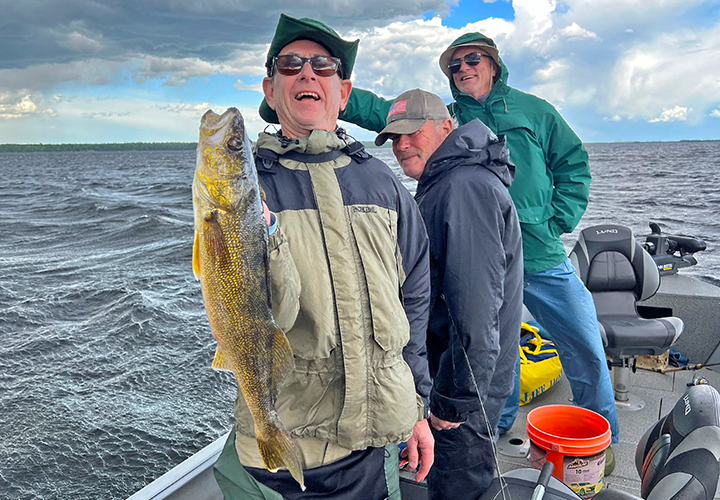 image of brian shields holding big walleye caught on fishing charter with pro guide Jeff Sundin 