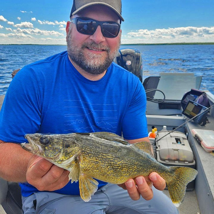 John Skoglund with nice walleye caught by wiggle worming