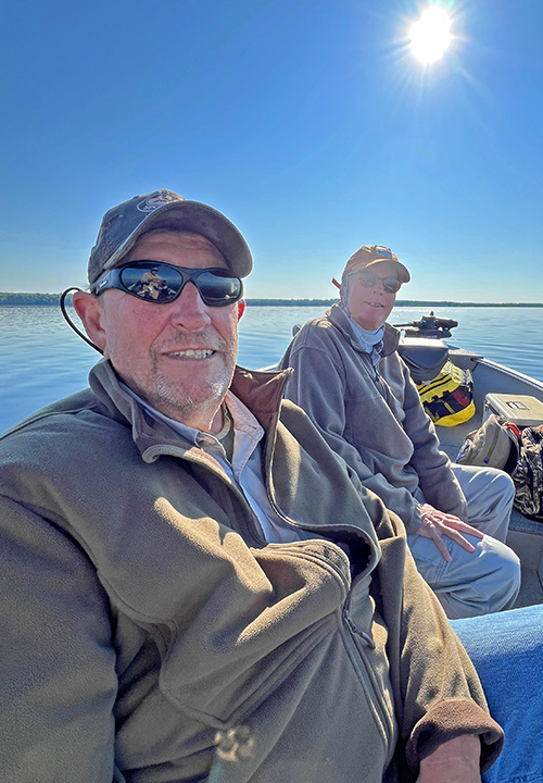 image of Spencer Schram and Stew Wilson walleye fishing