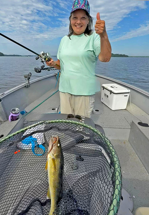 image of the Hippie Chick with nice walleye from Lake Vermilion
