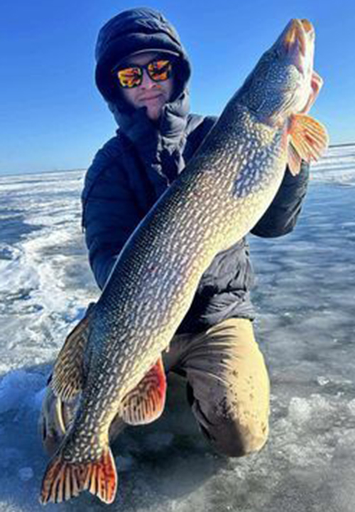 Shallow Water Pike Fishing Through The Ice - In-Fisherman
