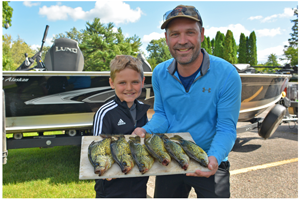 image of geoff and garrett glasrud with nice crappies