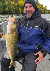 image of Randy Swenson with big leech lake walleye