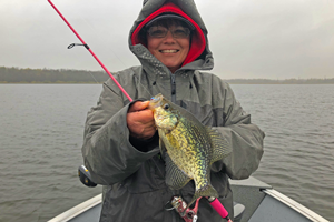 image of hippie chick with big crappie