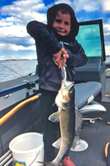 image of Trevin Johnson with big walleye