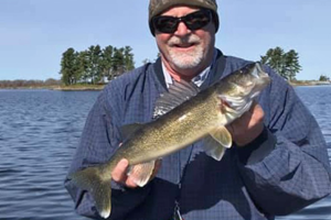 image of mike knutson with walleye