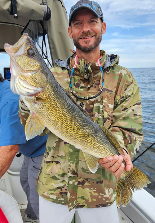 image of pay it forward event angler, Will Hangman with huge walleye