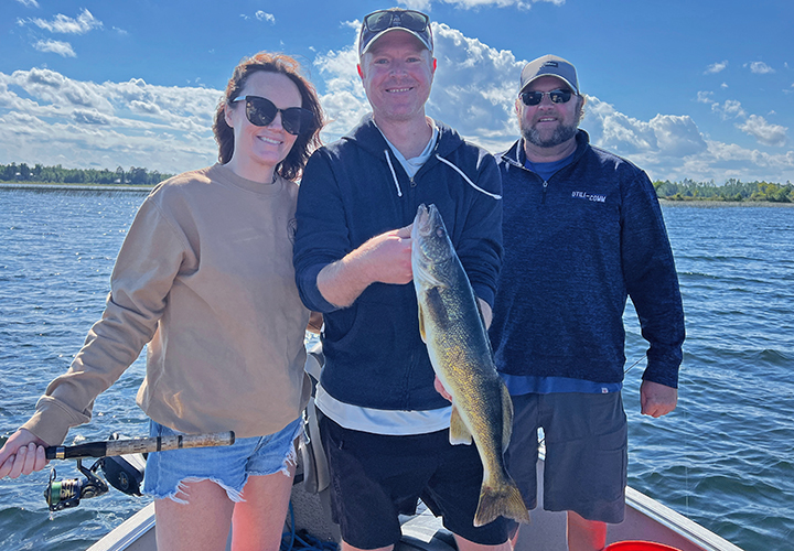 image of Trent and Kari Martin plus Chad on recent walleye fishing trip