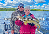 Penny Becker with nice walleye caught on a fishing charter with Hall of Fame fishing guide Jeff Sundin 