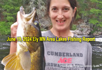 image of woman holding big walleye she caught near Ely MN