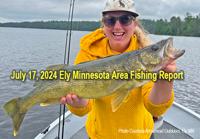 image of woman holding big walleye she caught near Ely Minnesota
