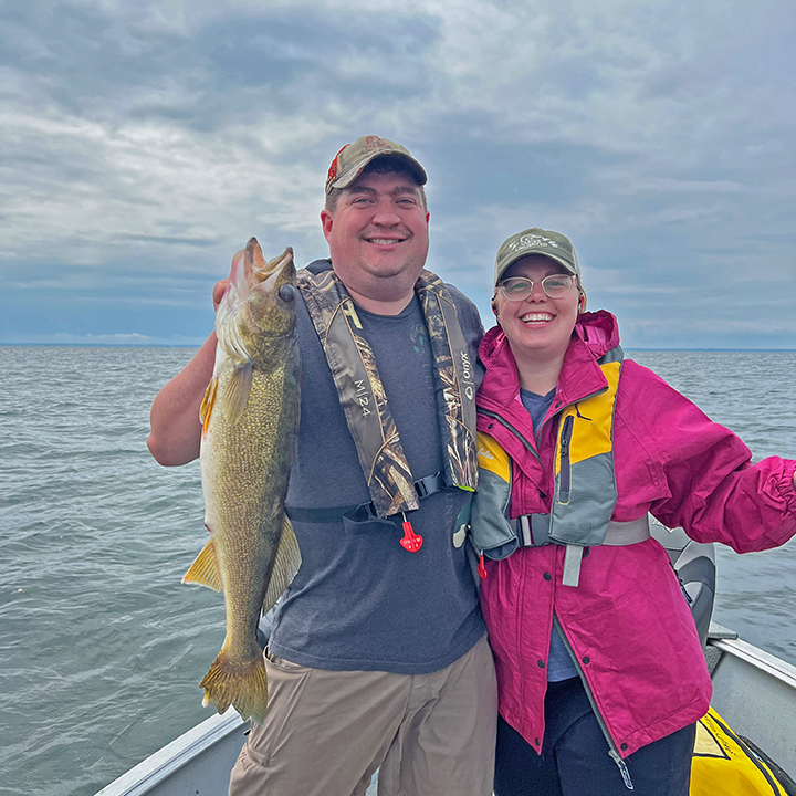 image of Anders and Alyssa Silverness with a nice walleye from Lake Winnie