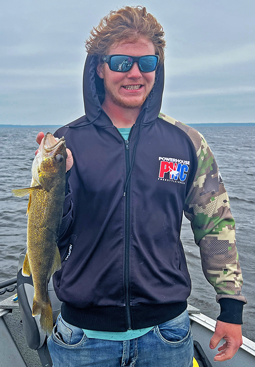 image of Miles Mundorf with nice walleye