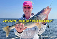 image of woman holding big walleye caught on a Wig Wam Resort fishing charter on Lake of the Woods