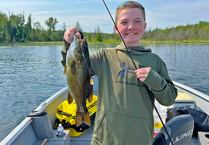 image of Landry Patterson holding nice smallmouth bass