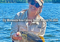 image of woman holding nice smallmouth bass