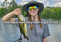 image of Olivia Smith holding largemouth Bass