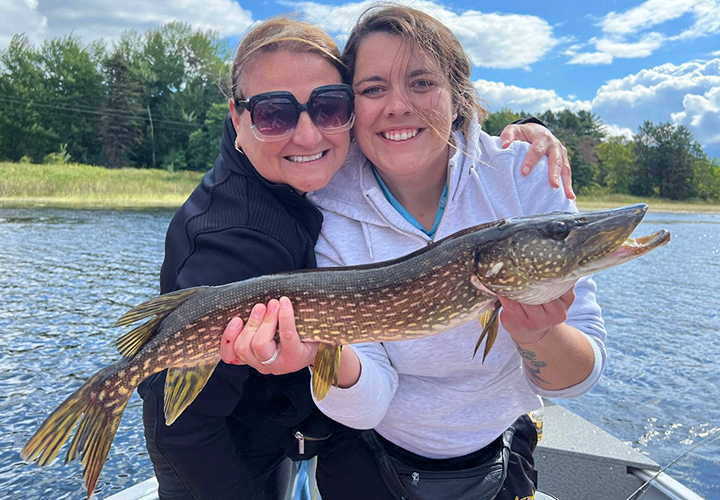 image of Luscious Sisters Lori and Kelly with nice northern pike 