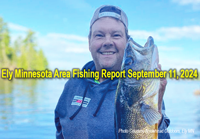 image of fisherman with big walleye caught near Ely Minnesota