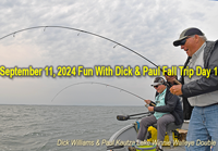 image of Paul Kautza and Dick Williams catching 2 walleyes at the same time on Lake Winnibigoshish