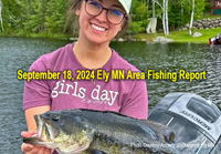 image of woman holding a big largemouth bass caught in the Ely MN area