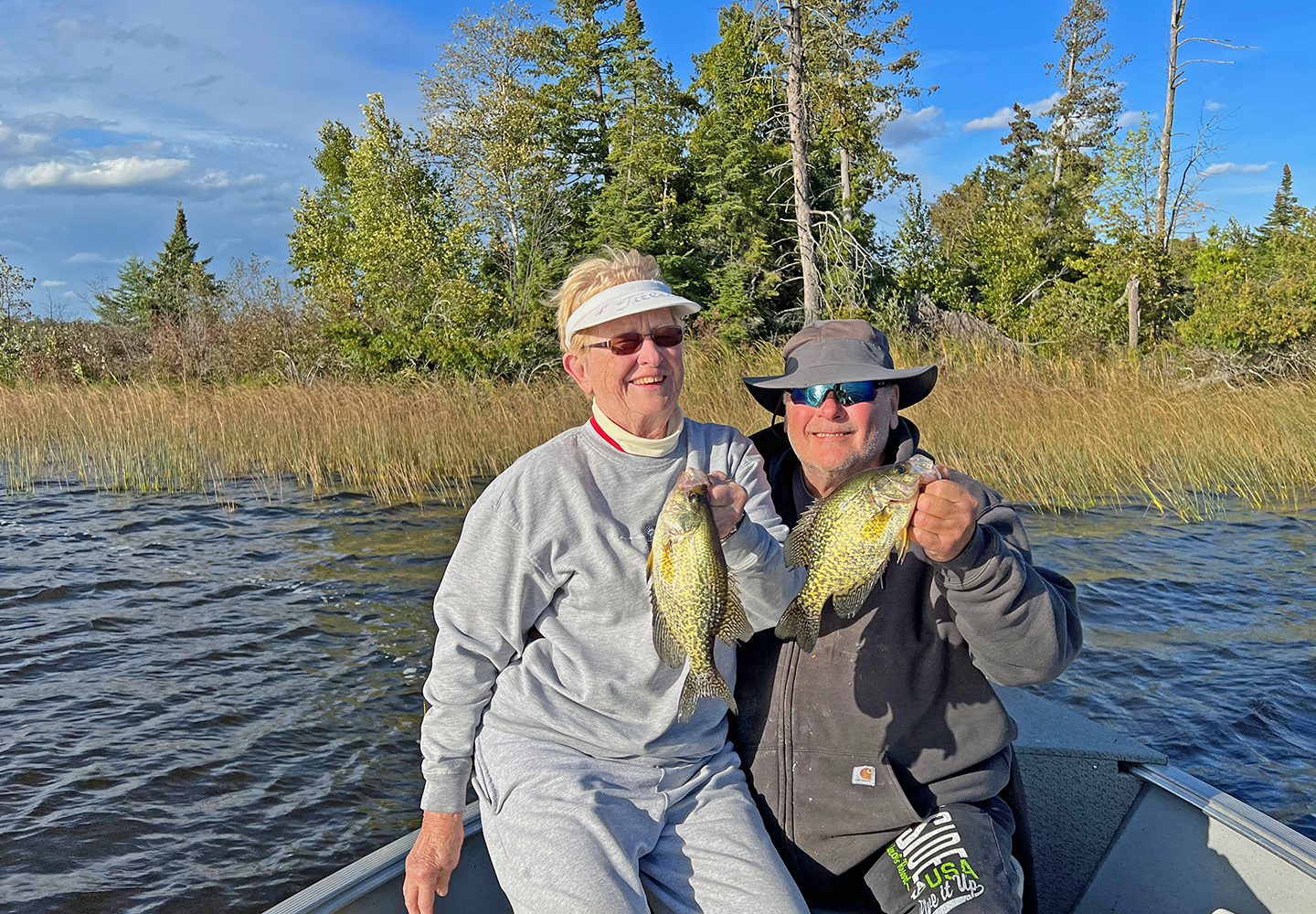 image of Kyle and Karen Reynolds with nice crappies caught near Grand Rapids