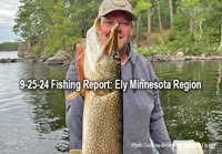 image of angler holding huge northern pike he caught in the Ely Minnewota Area