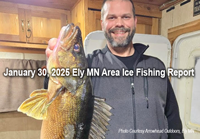 image of ice fisherman holding huge walleye he caught ice fishing near ely minnesota