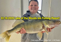 image of 13 year old boy holding huge walley he caught on lake of the woods