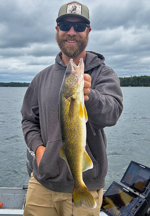 image of Joe Billiar holding a large walleye