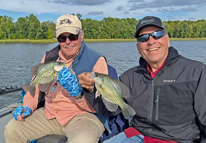 image of Dick Williams and Paul Kautza with a nice crappie double caught on fishing charter with Jeff Sundin 