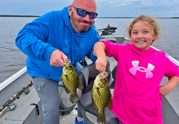 image of Patrick and Lucy Patterson with nice Bowstring Lake Crappies